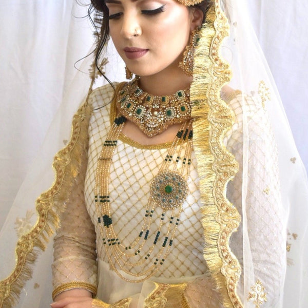 Hania- Emerald Polki Set with Teeka Jhoomar